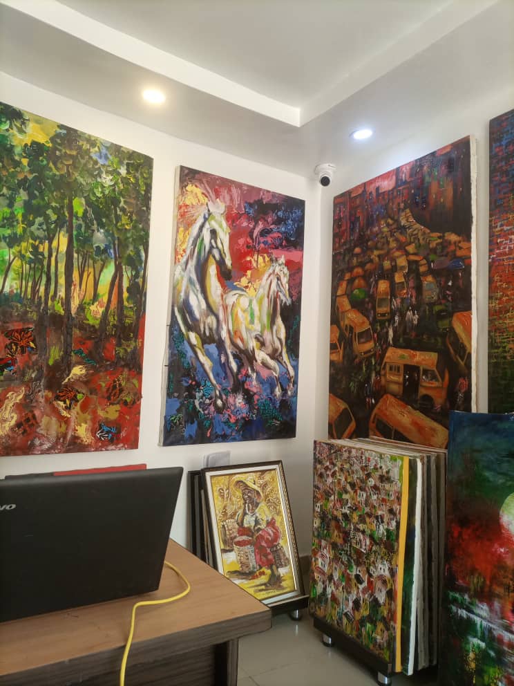 Showroom with art on every wall